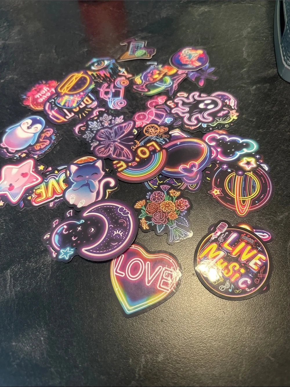Assorted pack of stickers. Most are 2x2 inches